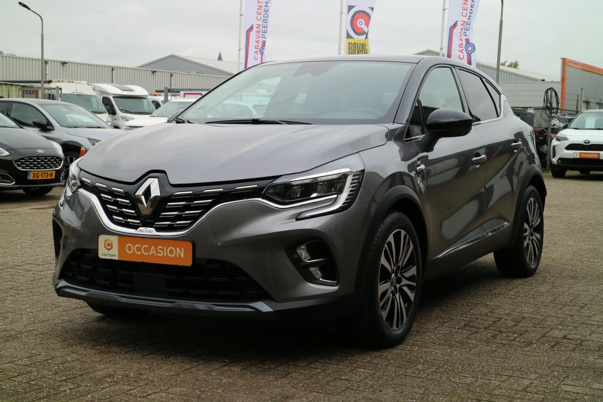 Renault Captur 1.6 E-Tech Plug-in Hybrid 160 Initiale Paris, Auto's, Dealer onderhouden, Gebruikt, 4 cilinders, 180 min