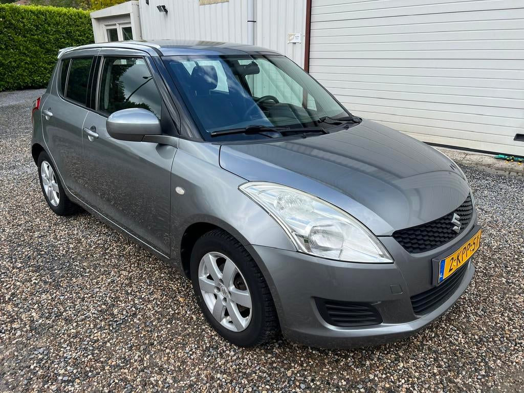 Suzuki Swift 1.2 Bandit EASSS AIRCO.APK.CRUISECONTROL.NAP!, Voorwielaandrijving, Stof, Gebruikt, 4 cilinders