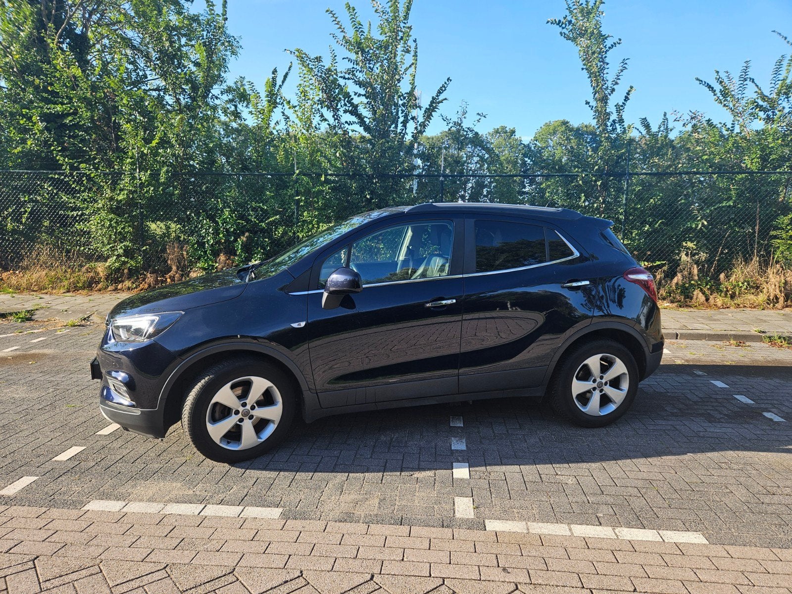 Opel Mokka X 1.4 Turbo APK 2027  135500km, Voorwielaandrijving, Zwart, Blauw, 1200 kg