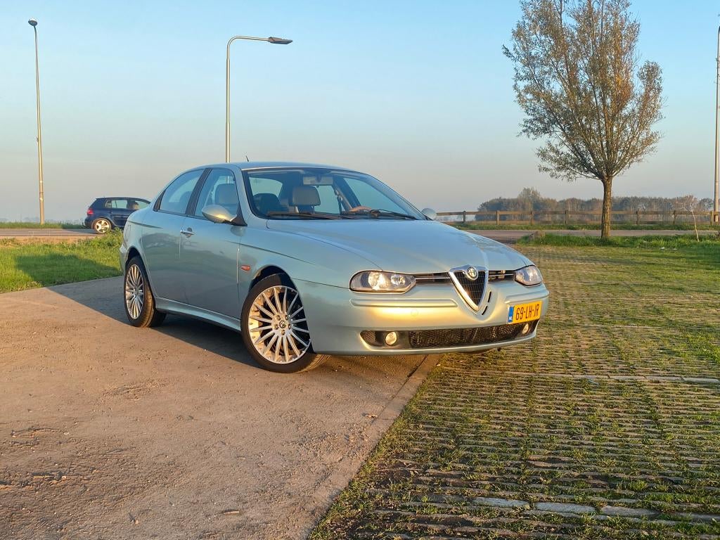 Alfa Romeo 156 azzurro nuvola 1.8 twin spark, Auto's, Alfa Romeo, Voorwielaandrijving, Euro 5, Zwart, 4 cilinders