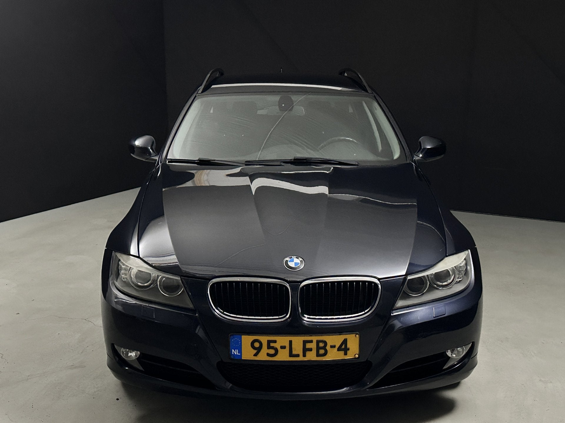 BMW 3 Serie Touring 318i Business Line *Navi*AC* (bj 2010), Euro 5, Achterwielaandrijving, Blauw, Origineel Nederlands