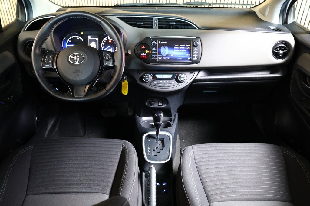 Toyota Yaris 1.5 Hybrid Executive NAVIGATIE CAMERA BT LANE ', Auto's, Gebruikt, 4 cilinders, Wit, Origineel Nederlands