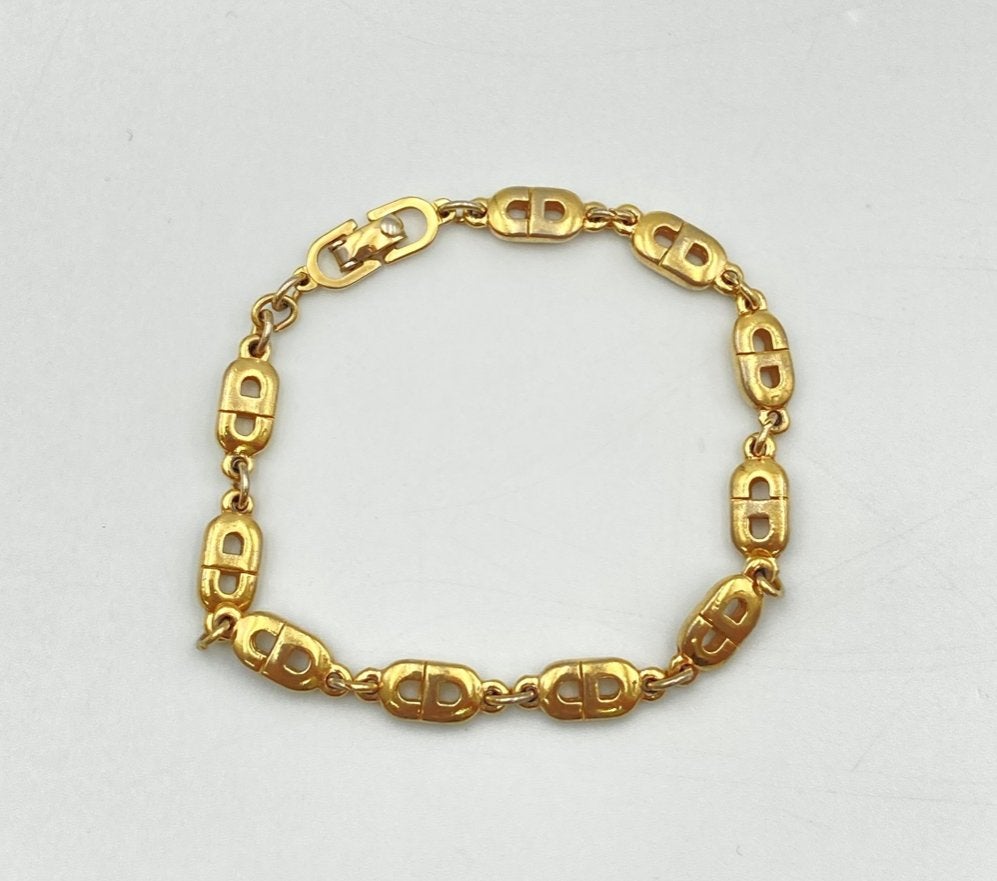 Vintage Christian Dior CD Logo Armband Goud, Ophalen of Verzenden, Gebruikt, Goud, Overige materialen