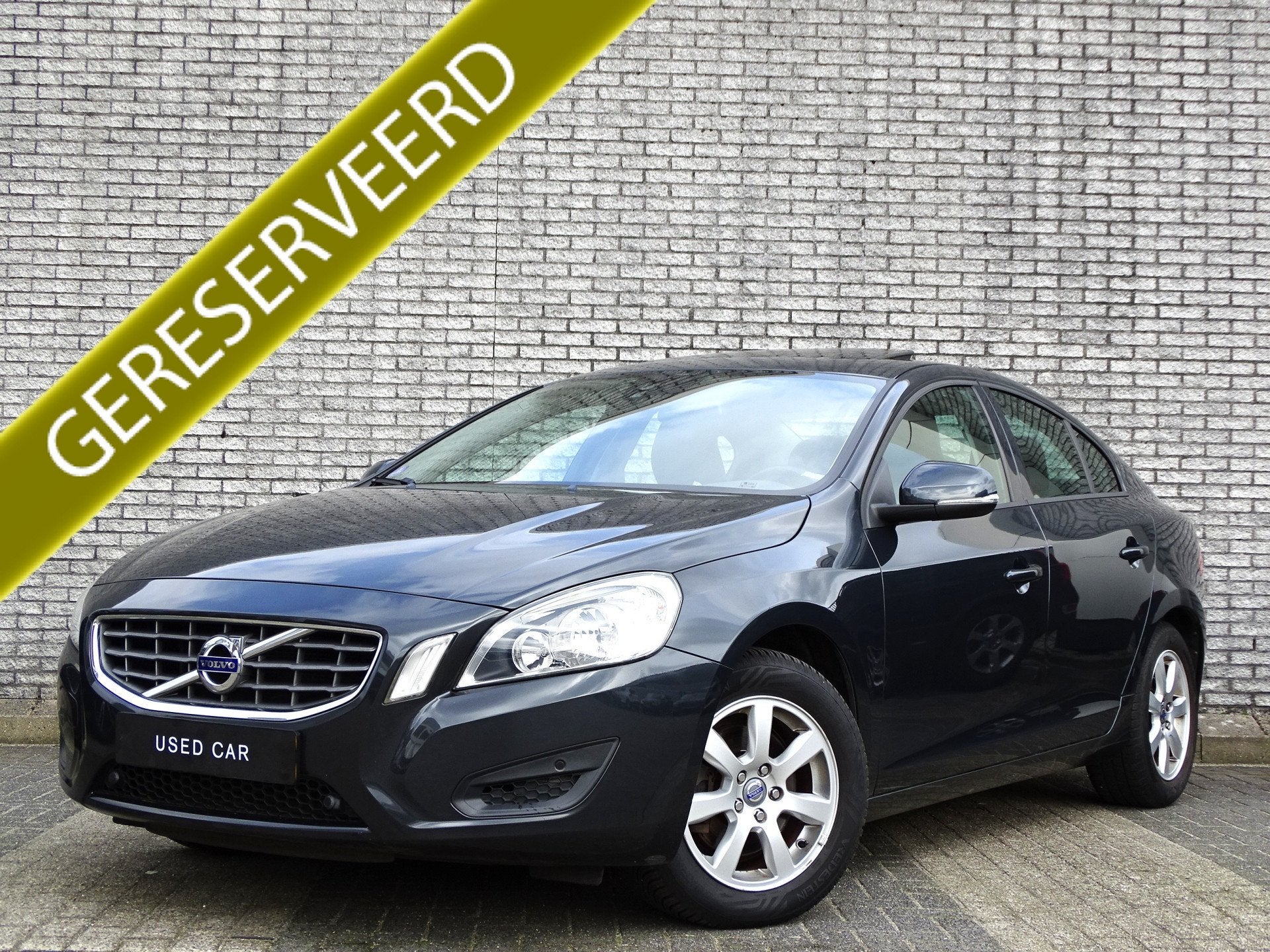 Volvo S60 1.6 T4F Kinetic | Leder | Trekhaak | Schuif- / kan, Gebruikt, Zwart, Met garantie (alle), 179 pk