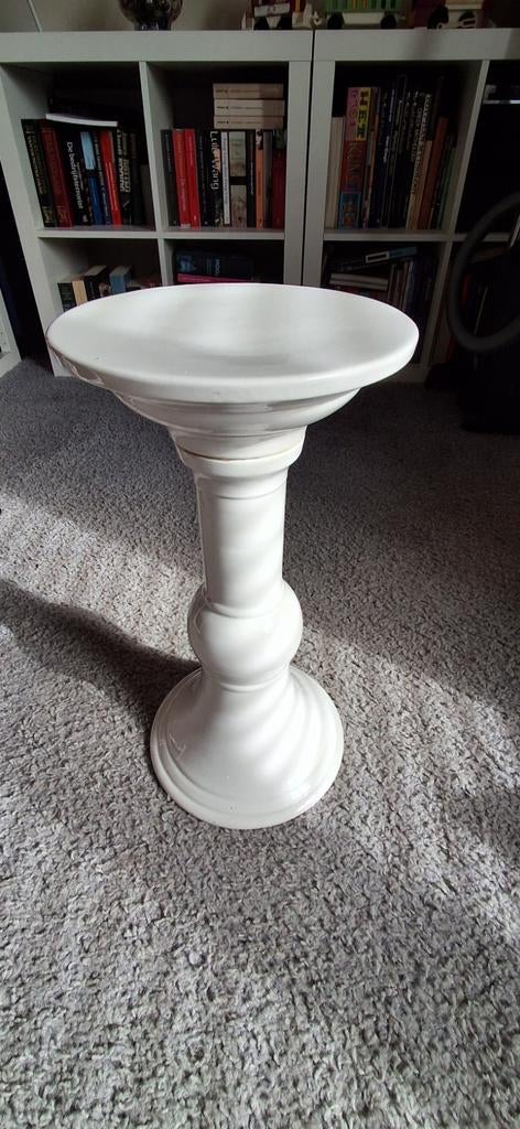 Witte plantenzuil, Ophalen