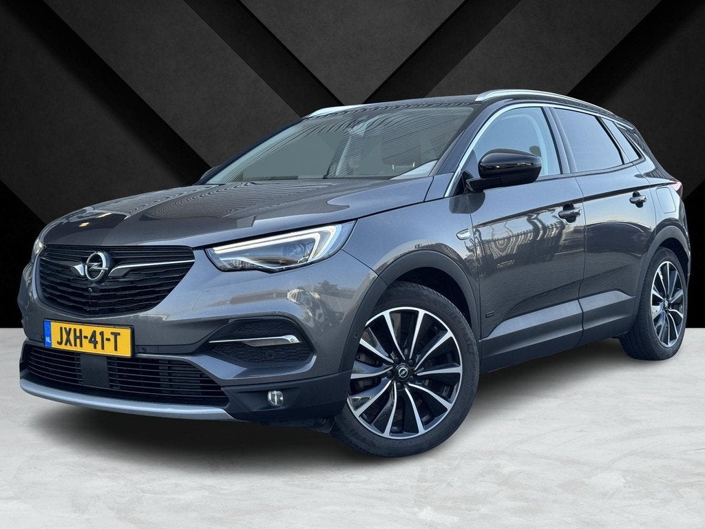 Opel Grandland X Ultimate+ 1.6 HYbrid4 PHEV 300pk 4x4 e-EAT8, Auto's, Opel, Automaat, Gebruikt, 4 cilinders, Bedrijf