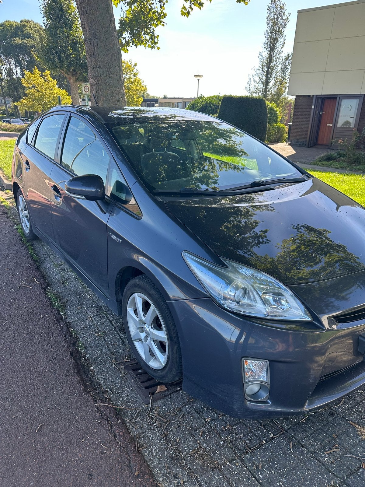 Toyota Prius 1.8 Full Hybrid 136PK Aut 2012 Grijs, Auto's, 1345 kg, 4 cilinders, Origineel Nederlands, 26 km/l
