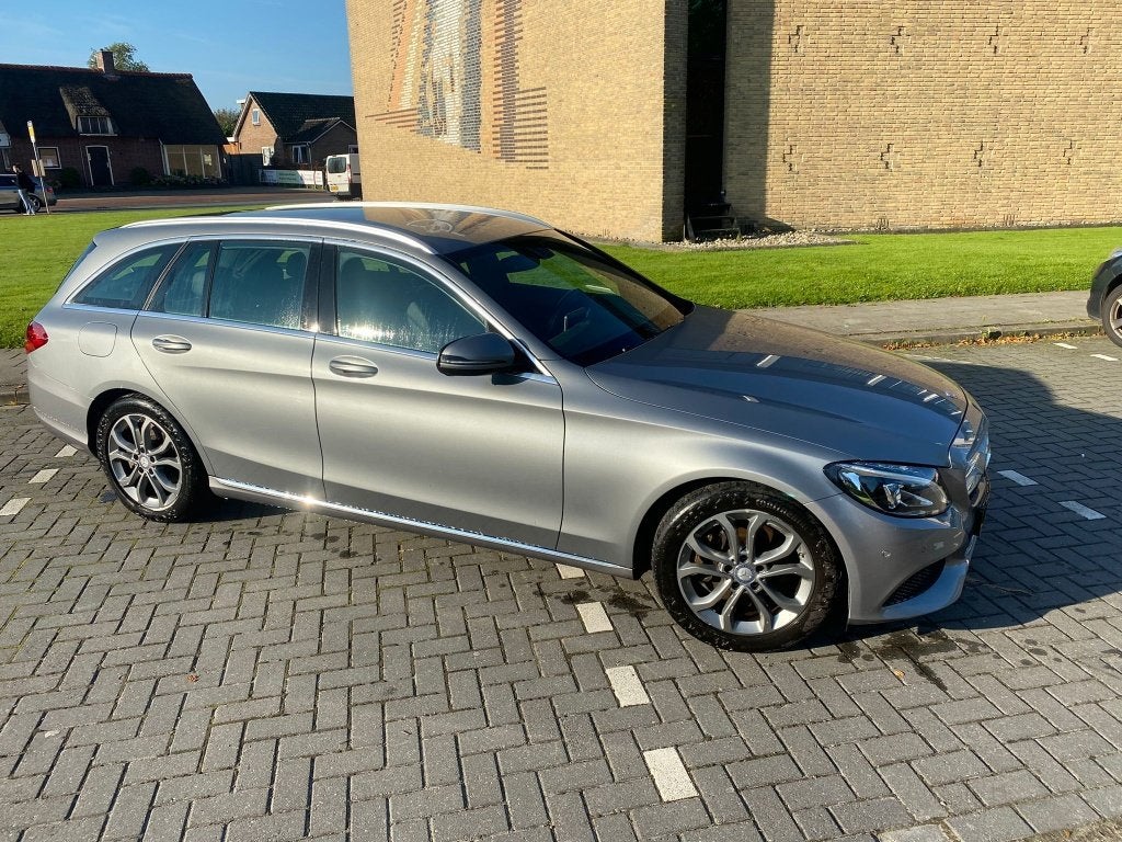 Mercedes-Benz C-Klasse C300 h 231pk 7G-TRONIC 2017 Grijs, Auto's, Automaat, Achterwielaandrijving, Zwart, Origineel Nederlands