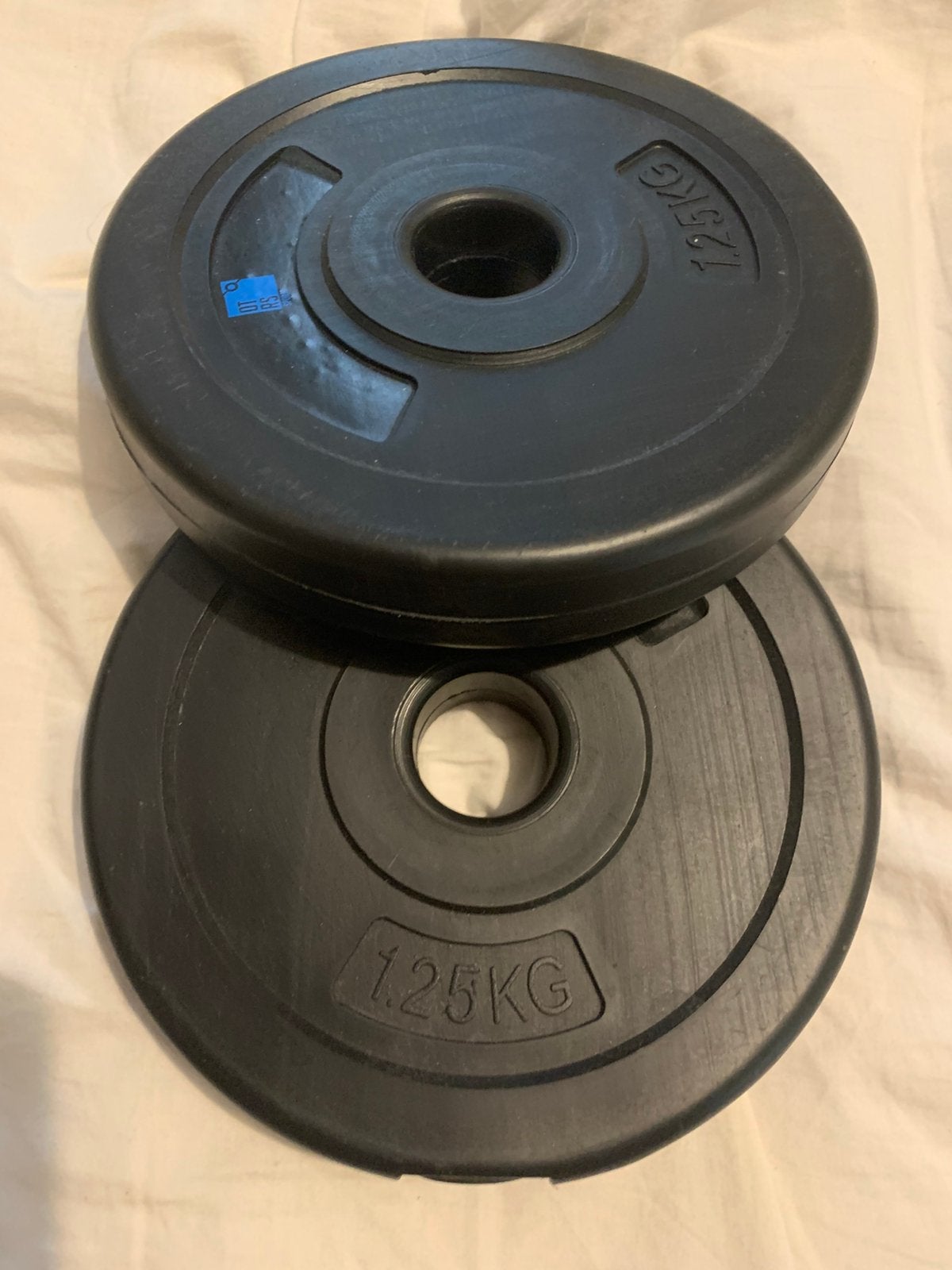 Halterschijven 1,25 kg 2 stuks, Ophalen, Zo goed als nieuw, Halterschijven