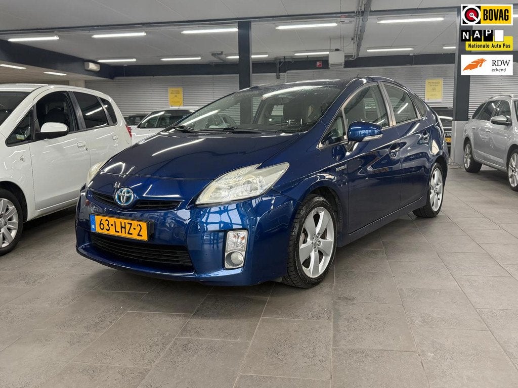 Toyota Prius 1.8 Aspiration 1-eigenaar clima cruise control, Auto's, Toyota, Stof, Gebruikt, 4 cilinders, Blauw