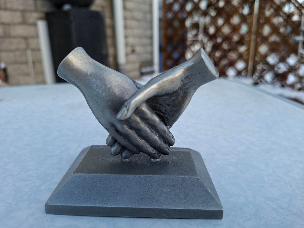 beeld de handdruk van tin, Ophalen, Zo goed als nieuw, Mens