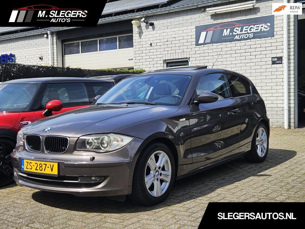 BMW 1-serie 118i*Panodak*Airco*Cruise*Xenon*APK 2027, 1-Serie, Parkeersensor, Achterwielaandrijving, Bruin