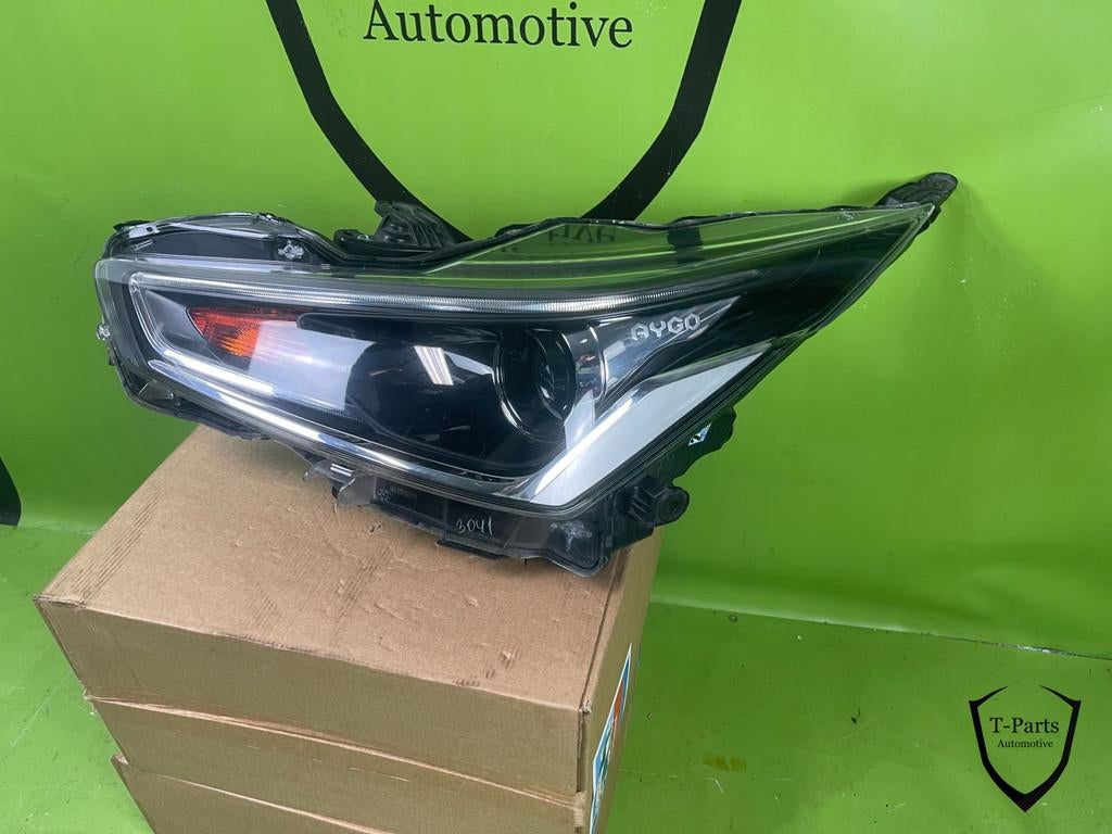toyota aygo links koplamp lamp 811700H210, Auto-onderdelen, Info@fabrikant.eu, Ophalen of Verzenden, Toyota, Fabrikantstraat 1
1000 AA  Amsterdam
