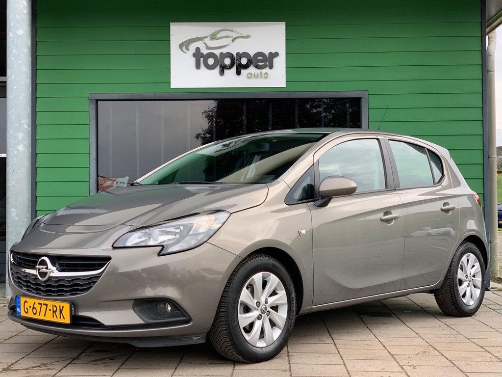 Opel Corsa 1.4 Cosmo Edition | Navigatie | Elektrische Ramen, Auto's, Opel, 1063 kg, Gebruikt, 4 cilinders, Bruin
