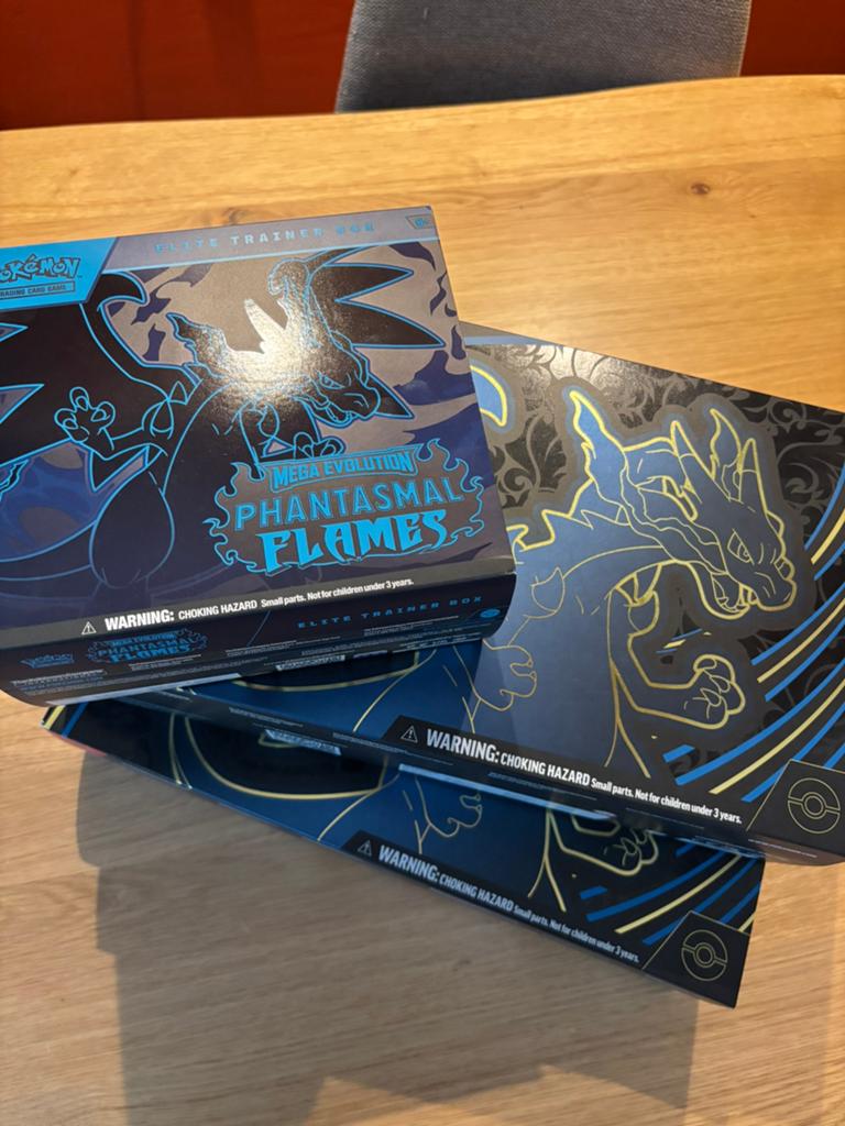 Charizard UPC 2x + phasmantal flames ETB geopend, Ophalen of Verzenden, Zo goed als nieuw