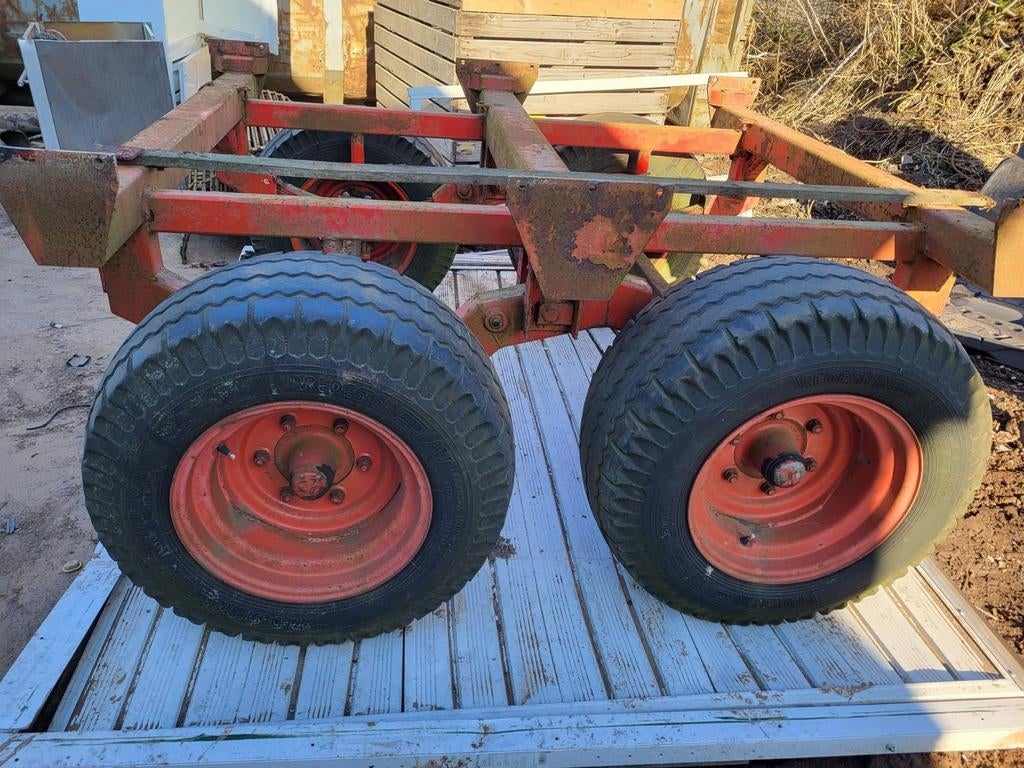 Te koop tandemas stel van n ladewagen, Ophalen