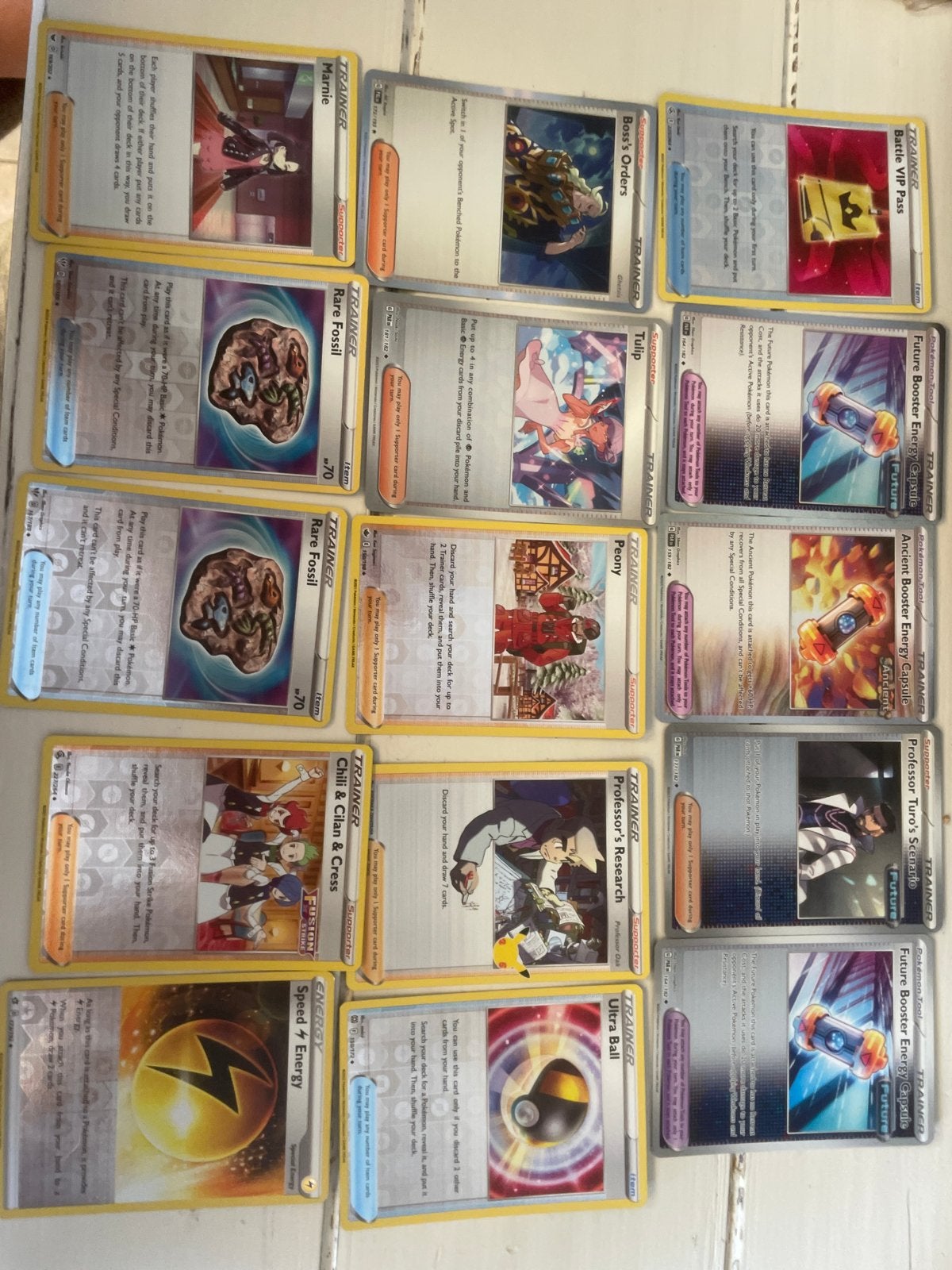 15 Trainer Holo Pokémon kaarten - Zeldzaam en Glanzend, Ophalen of Verzenden, Zo goed als nieuw, Meerdere kaarten, Foil