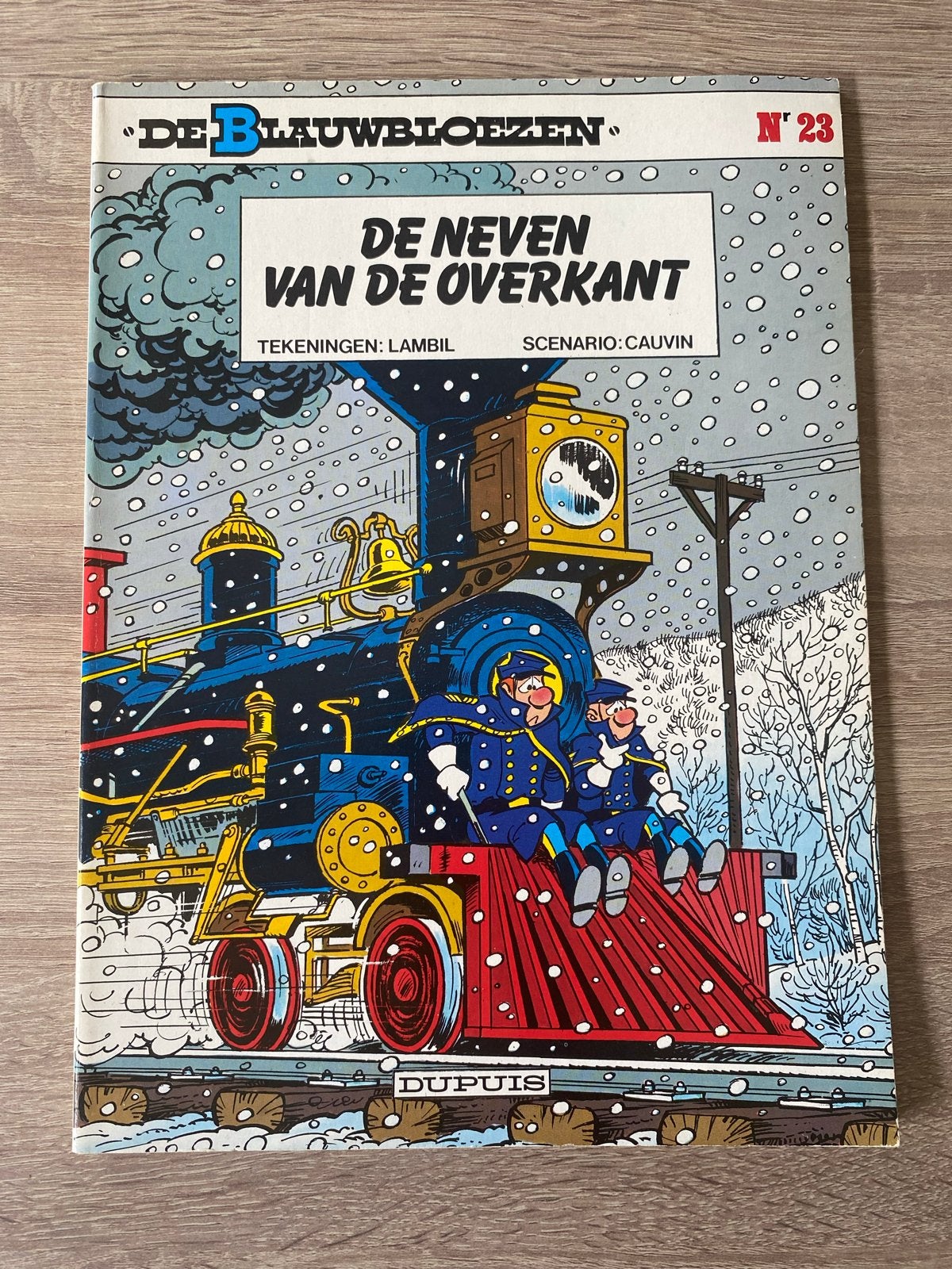 De Blauwbloezen - 23. De neven van de overkant, Boeken, Eén stripboek, Ophalen of Verzenden, Gelezen