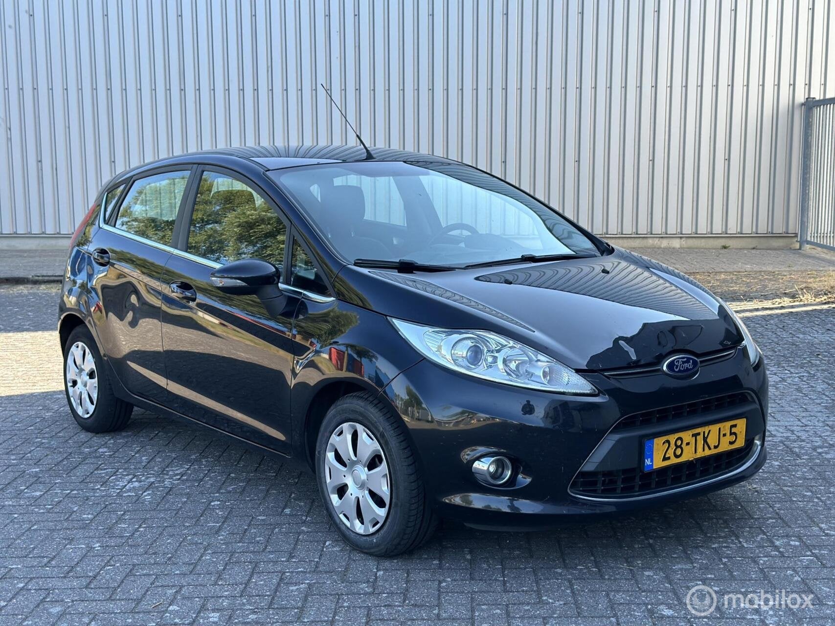 Ford Fiesta 1.6 TDCi ECOnetic Titanium Airco apk 1-7-2027, Auto's, Voorwielaandrijving, Stof, Gebruikt, Parkeersensor