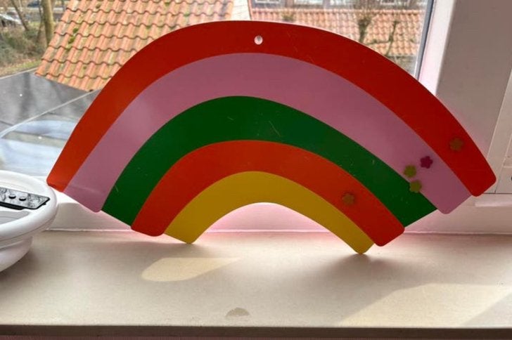 Magneetbord regenboog Hema, Ophalen