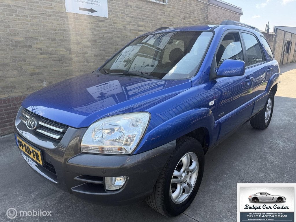 Kia Sportage 2.0 CVVT Adventure 4WD, Auto's, Kia, Gebruikt, Blauw, Bedrijf, Handgeschakeld