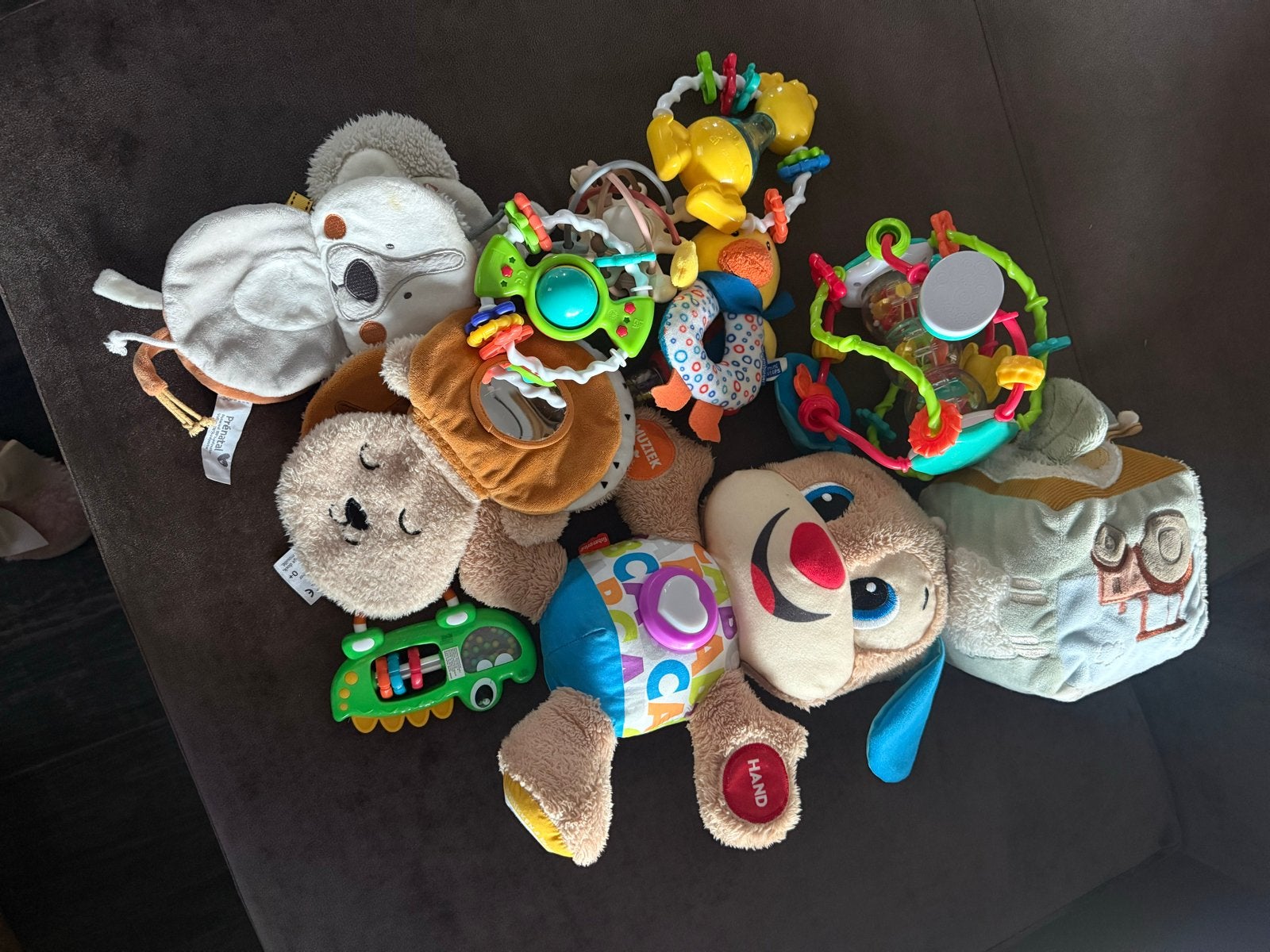 Grote set baby speelgoed: rammelaars, knuffels en meer, Ophalen of Verzenden, Gebruikt, Rammelaar, Met geluid