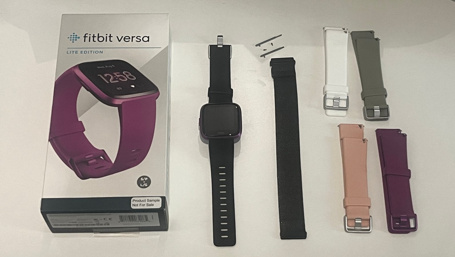 Fitbit Versa Lite Edition - Paars met extra bandjes, Gebruikt, Hartslag, Paars, Ophalen of Verzenden