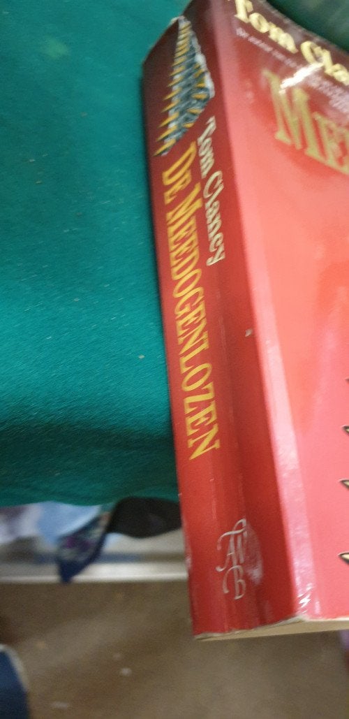 boek de meedogen-lozen , tom clancy, Boeken, Ophalen of Verzenden