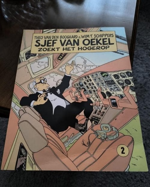 Sjef van Oekel - "Zoekt het hogerop", Gelezen, Ophalen of Verzenden, Theo van den Boogaard & Wim T. Schippers, Eén stripboek