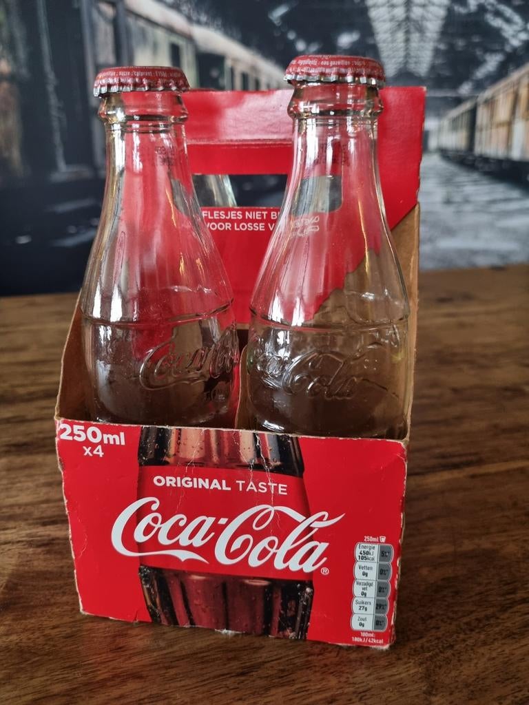 Coca-Cola 250ml flesjes in verpakking (4 stuks), Ophalen of Verzenden, Gebruikt, Verpakking