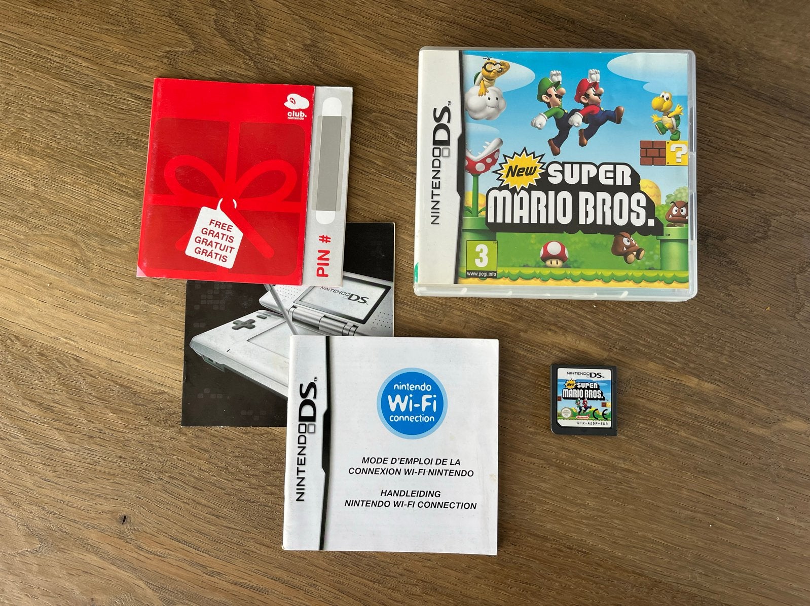 New Super Mario Bros. Nintendo DS met handleiding, Spelcomputers en Games, Online, 1 speler, Ophalen of Verzenden, Zo goed als nieuw