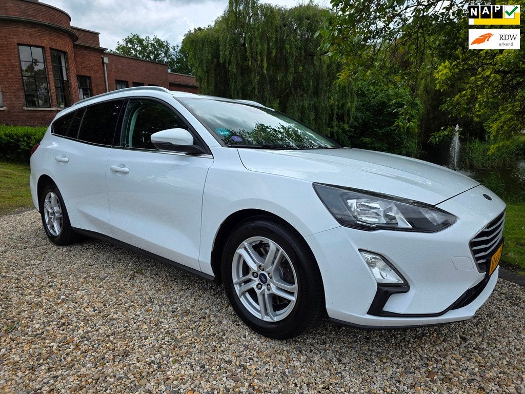 Ford Focus Wagon 1.0 EcoBoost Trend Edition Business, Auto's, 101 pk, Gebruikt, 1283 kg, Wit