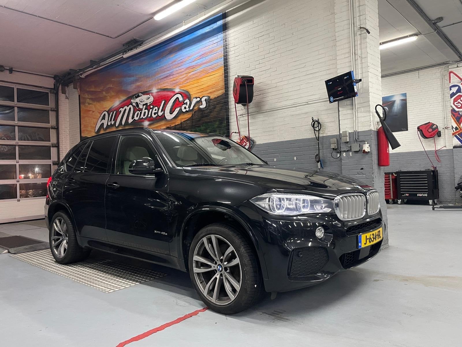 BMW X5 XDrive40e iPerformance High Executive, Gebruikt, 4 cilinders, Zwart, Bedrijf