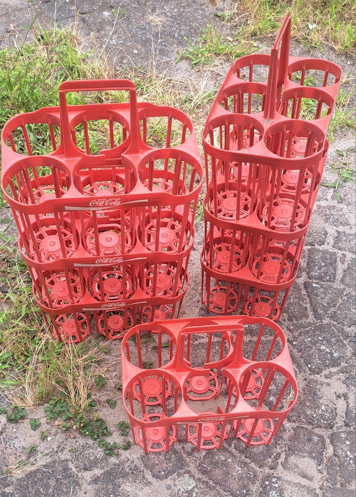 Vintage Coca-Cola flessenhouders - 9 stuks, Coca-Cola Company, Gebruikt, Info@coca-cola.nl, Ophalen of Verzenden
