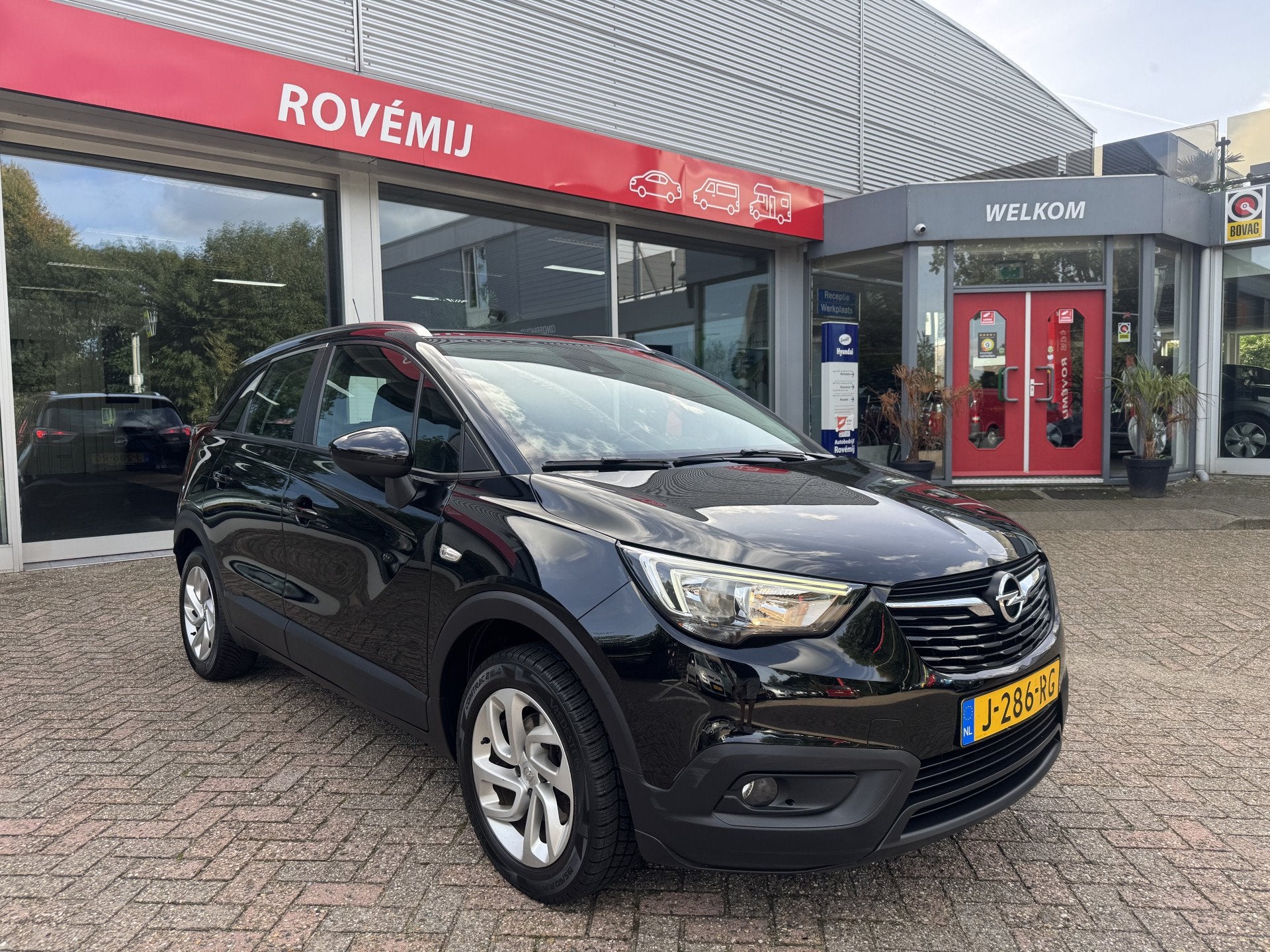 Opel Crossland X 1.2 Turbo Edition RIJKLAARPRIJS, Carplay, T, Auto's, Gebruikt, 1199 cc, Leder en Stof, Zwart