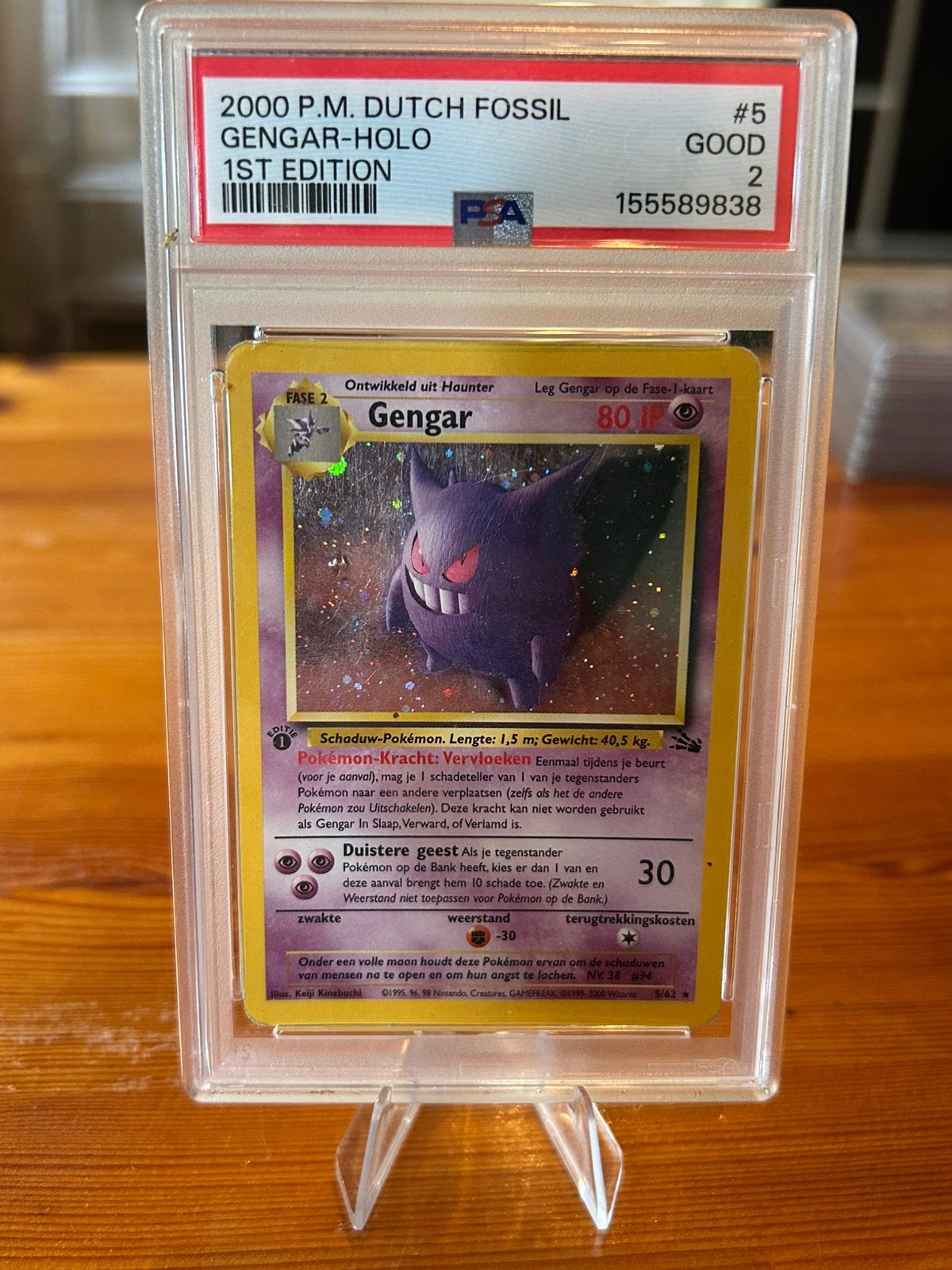 Gengar Fossil 1st Edition 5/62 Nederlands PSA 2 Holo, Ophalen of Verzenden, Zo goed als nieuw