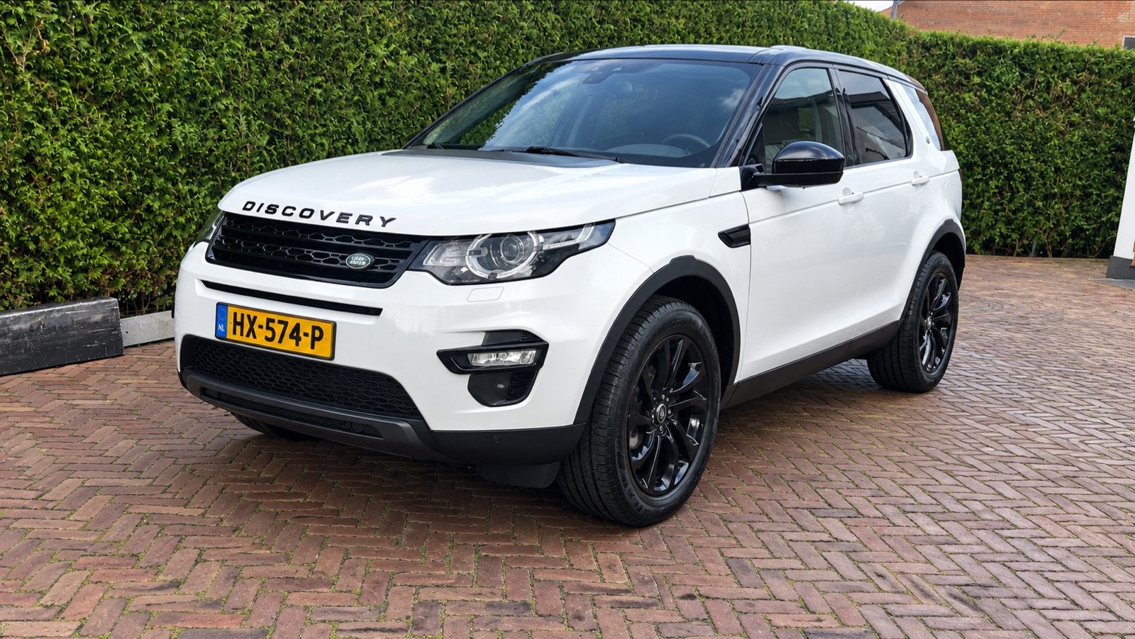 Land Rover Discovery Sport 2.2 SI4 4WD Aut9 2016 Wit, Auto's, Automaat, 1733 kg, Zwart, 4 cilinders