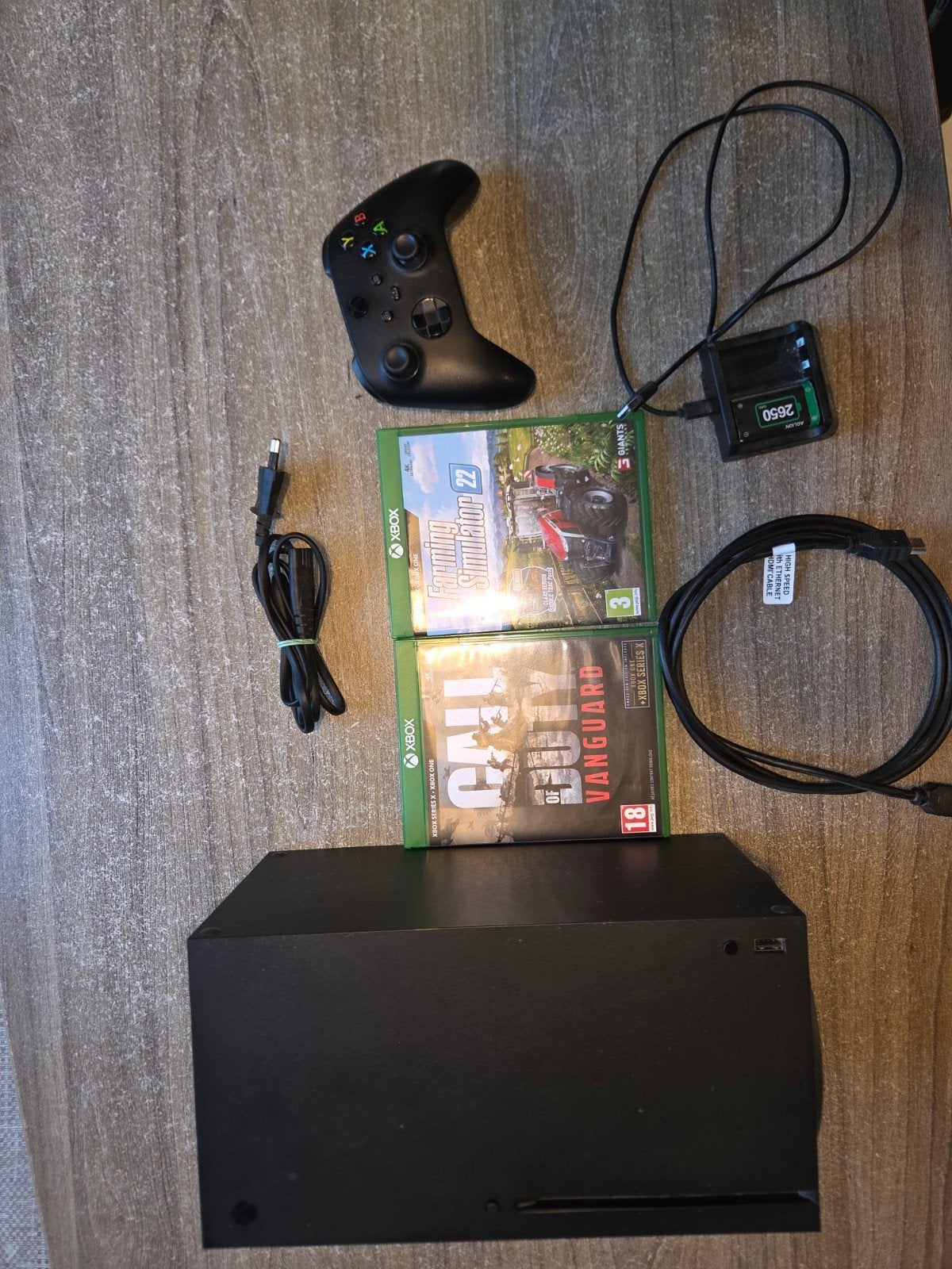 Xbox Series X met controller, 2 games en oplaadstation