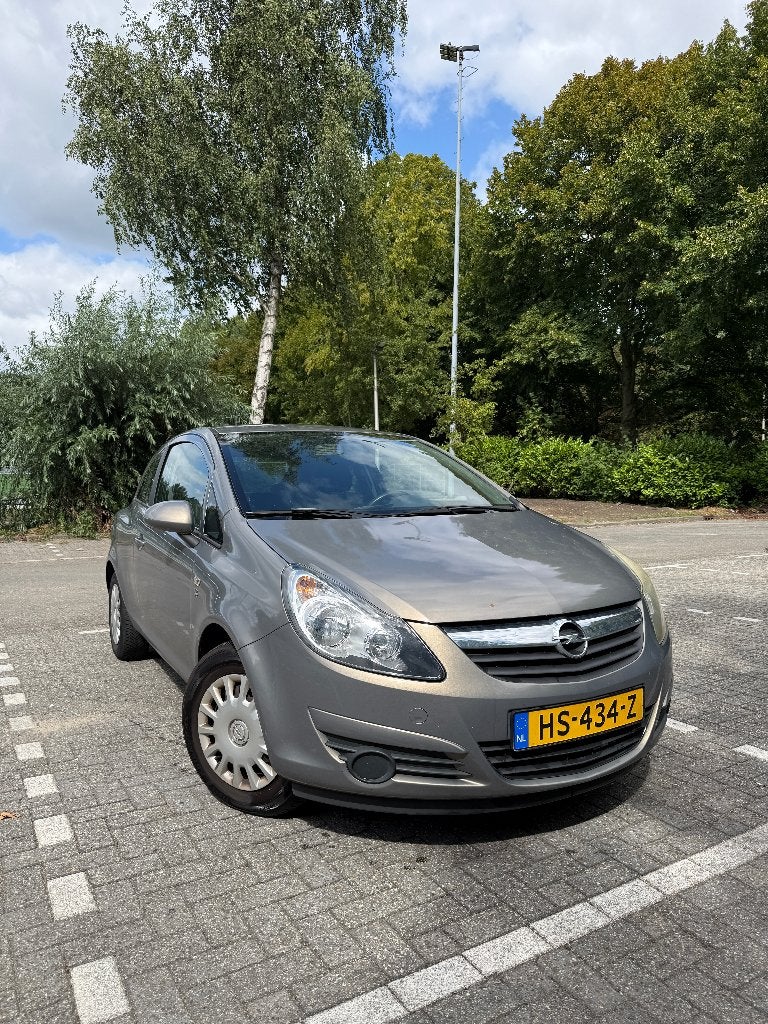 Opel Corsa 1.2 Ecoflex 51KW 3D 2010 Bruin, Auto's, Opel, Voorwielaandrijving, 450 kg, 40 €/maand, Bruin