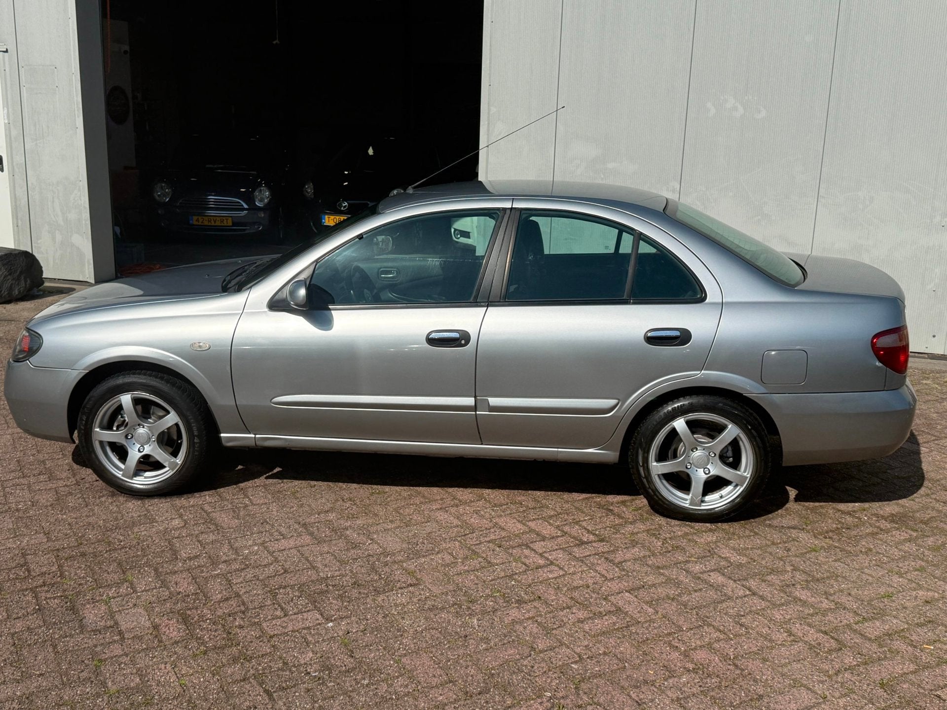 Nissan Almera 1.5 Visia, Auto's, Gebruikt, 1153 kg, Bedrijf, Handgeschakeld