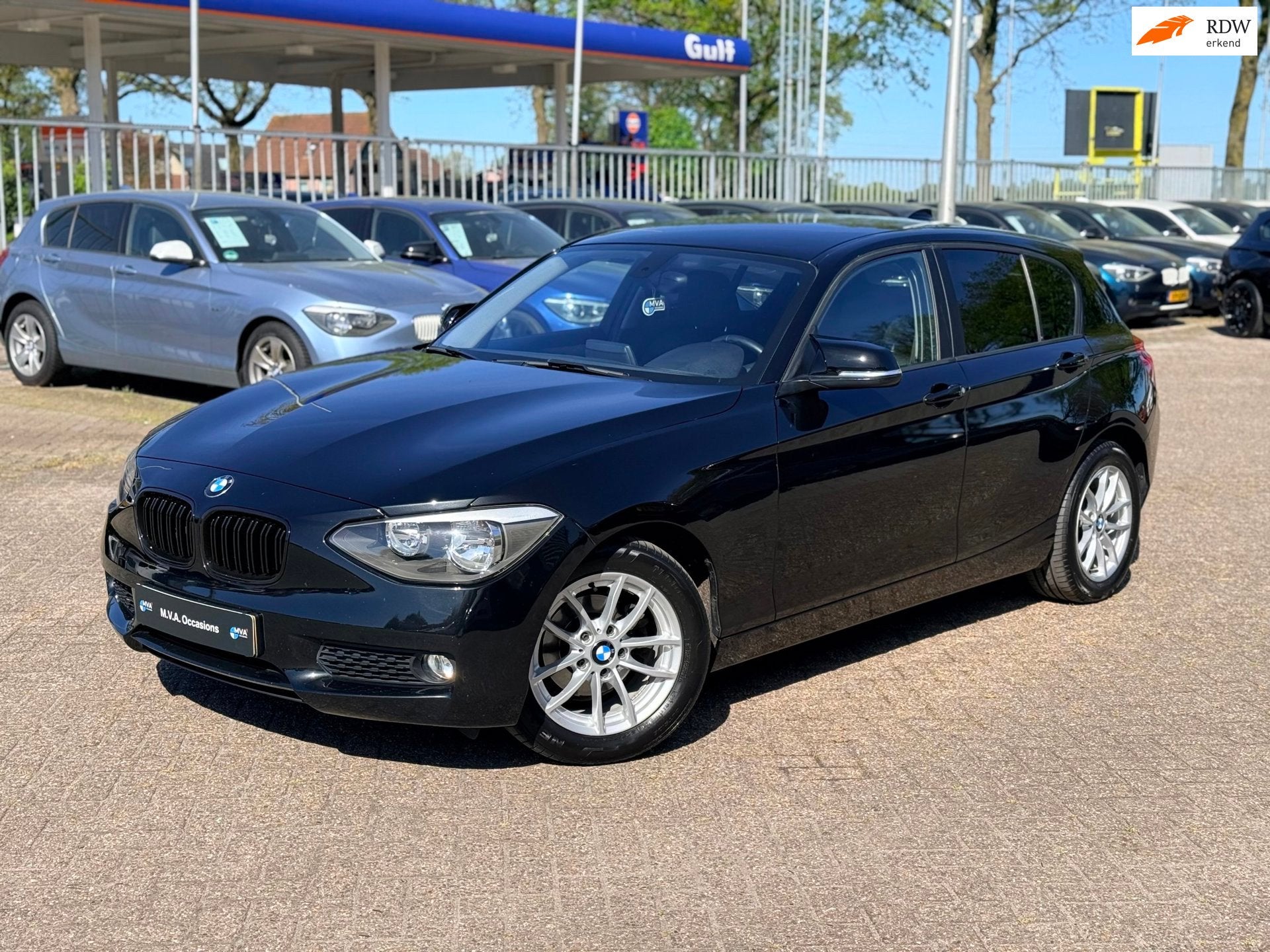 BMW 1-serie 116i Executive|Nieuwe Ketting + Klepseals|Climat, Auto's, 1-Serie, Gebruikt, Zwart, 19 km/l