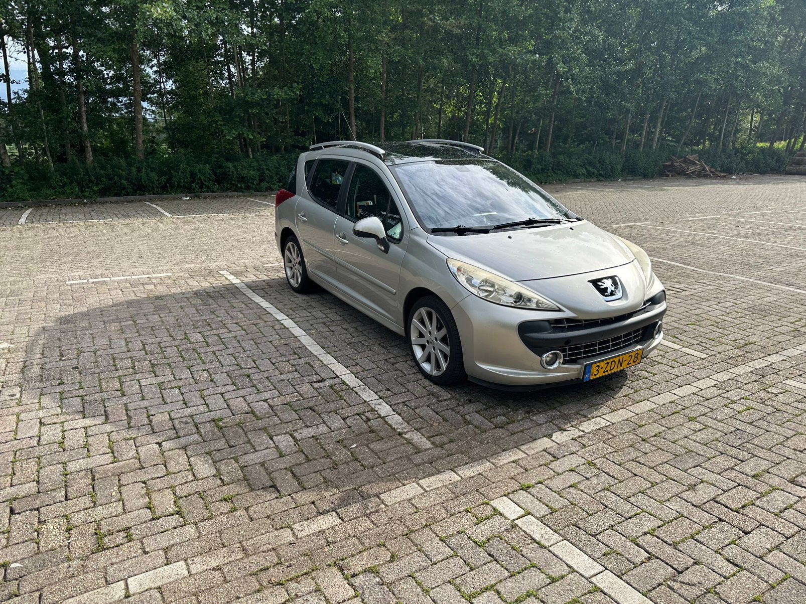Peugeot 207 1.6 16V SW Outdoor 2008 Grijs, Auto's, Peugeot, Voorwielaandrijving, Zwart, 4 cilinders, 1202 kg