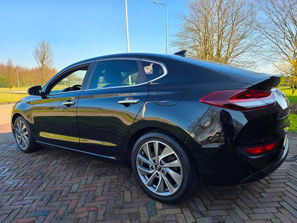 Hyundai I30 Fastback 1.4 T-GDI Premium NAVI/airco/TREKHAAK, Auto's, Hyundai, Voorwielaandrijving, Euro 6, 4 cilinders, Automatische klimaatregeling
