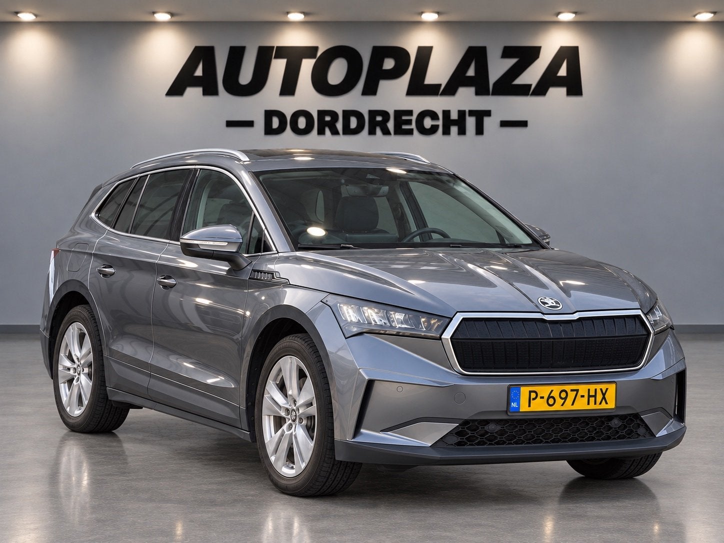 Skoda Enyaq iV 80 SOH 89.4%, Auto's, Dealer onderhouden, Gebruikt, Zwart, Verwarmde buitenspiegels