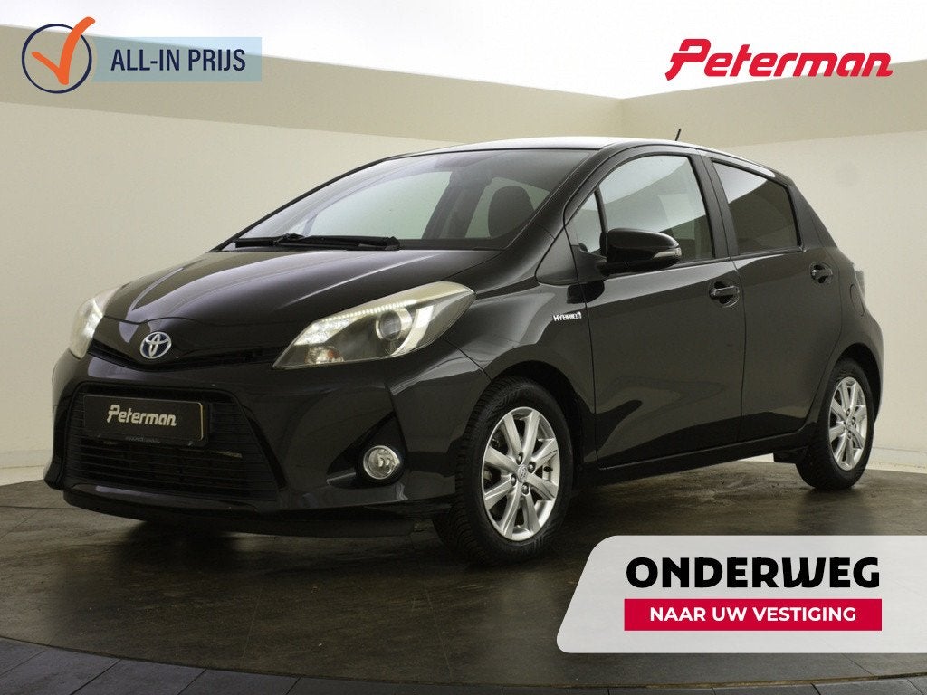 Toyota Yaris 1.5 Hybrid Dynamic | Navigatie | Camera | Trekh, Auto's, Automaat, 4 cilinders, 100 pk, Bedrijf