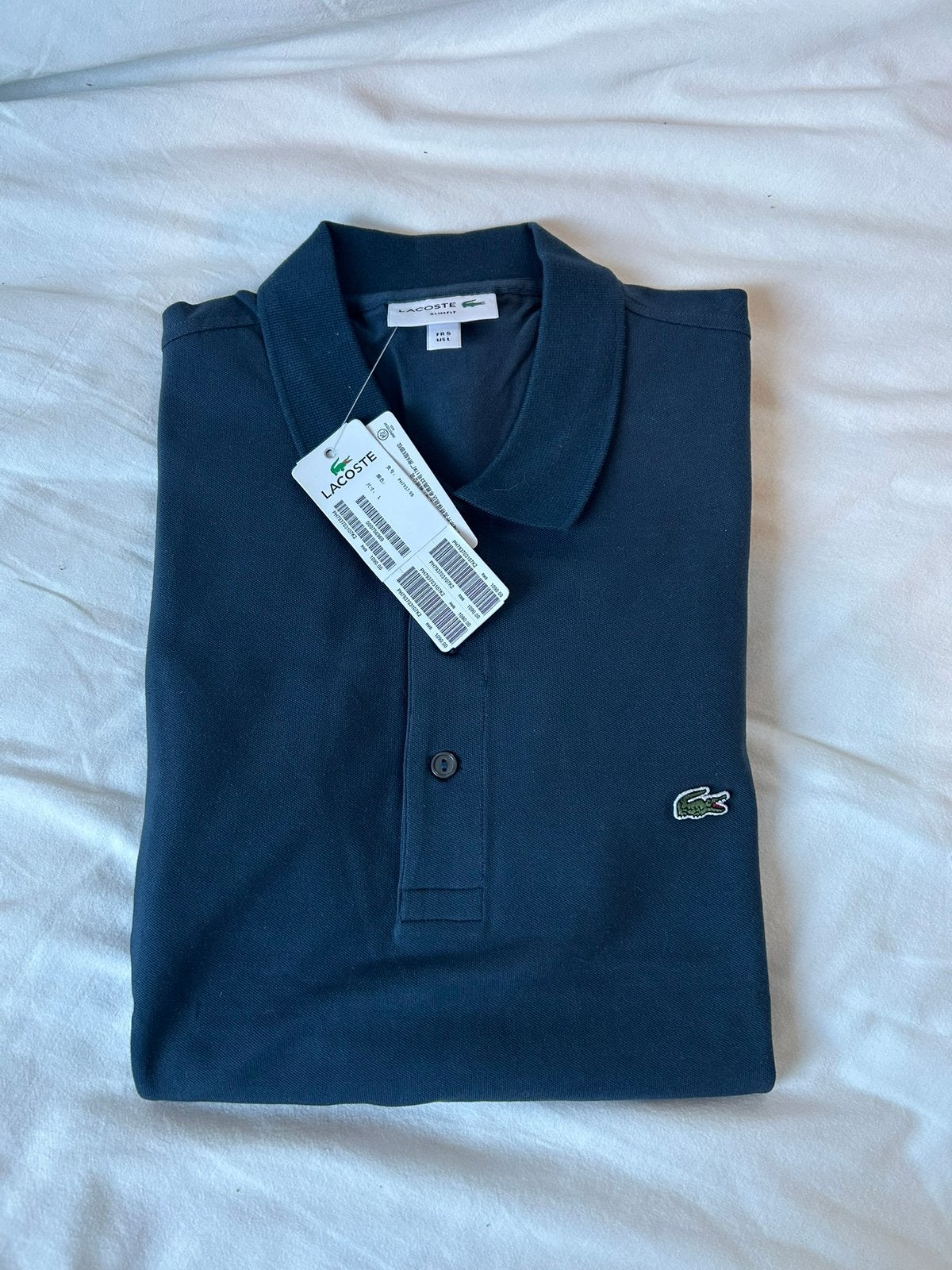 Lacoste polo blauw, Ophalen of Verzenden, Nieuw, Maat 52/54 (L), Blauw