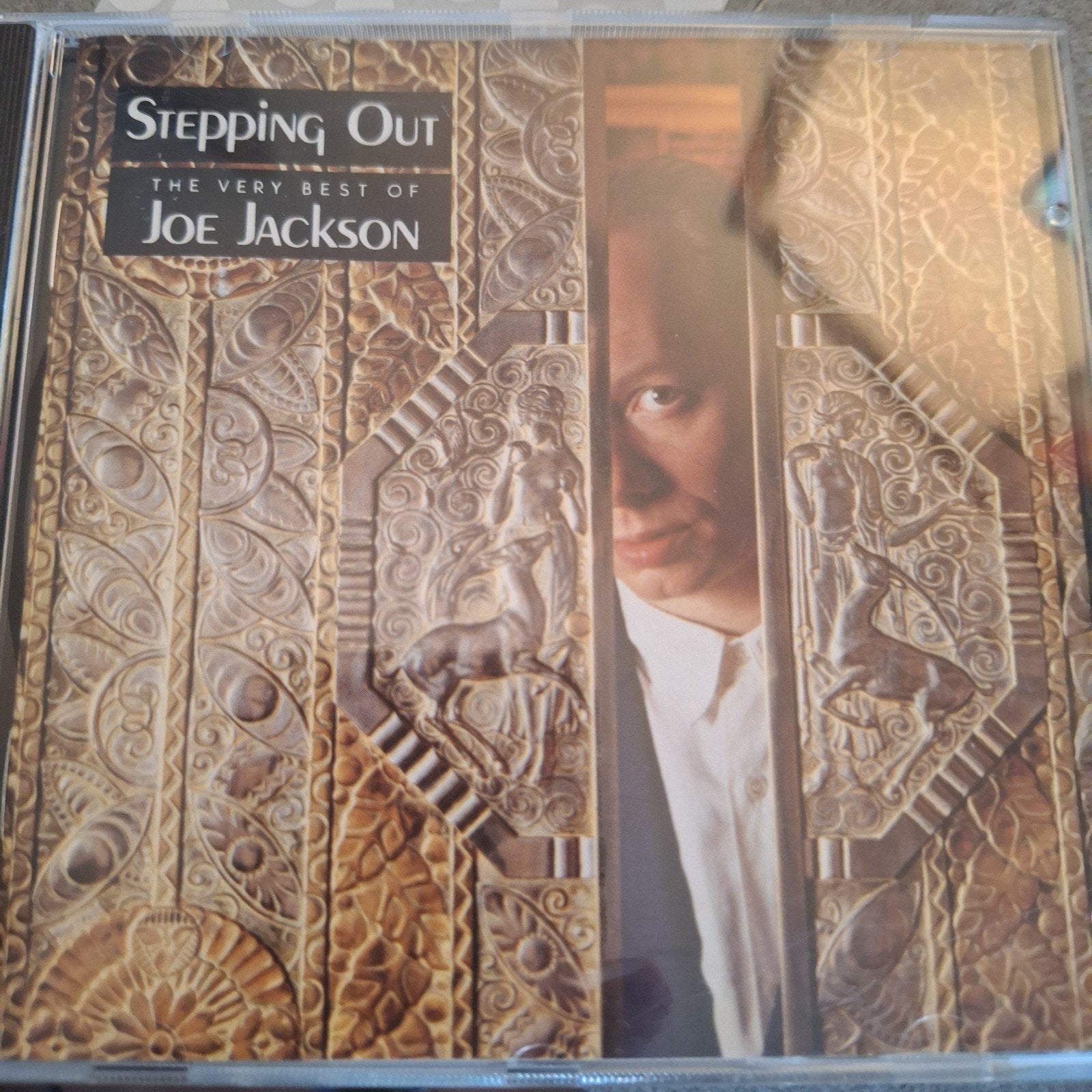 Joe Jackson - Stepping Out: The Very Best Of (CD), Gebruikt, Pop, Ophalen of Verzenden, Verzamelalbum