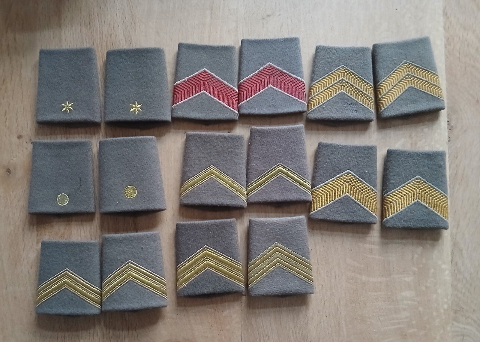 8 setjes schuifpassanten voor winterjas, Verzamelen, Militaria | Algemeen, Ophalen of Verzenden, Landmacht, Nederland