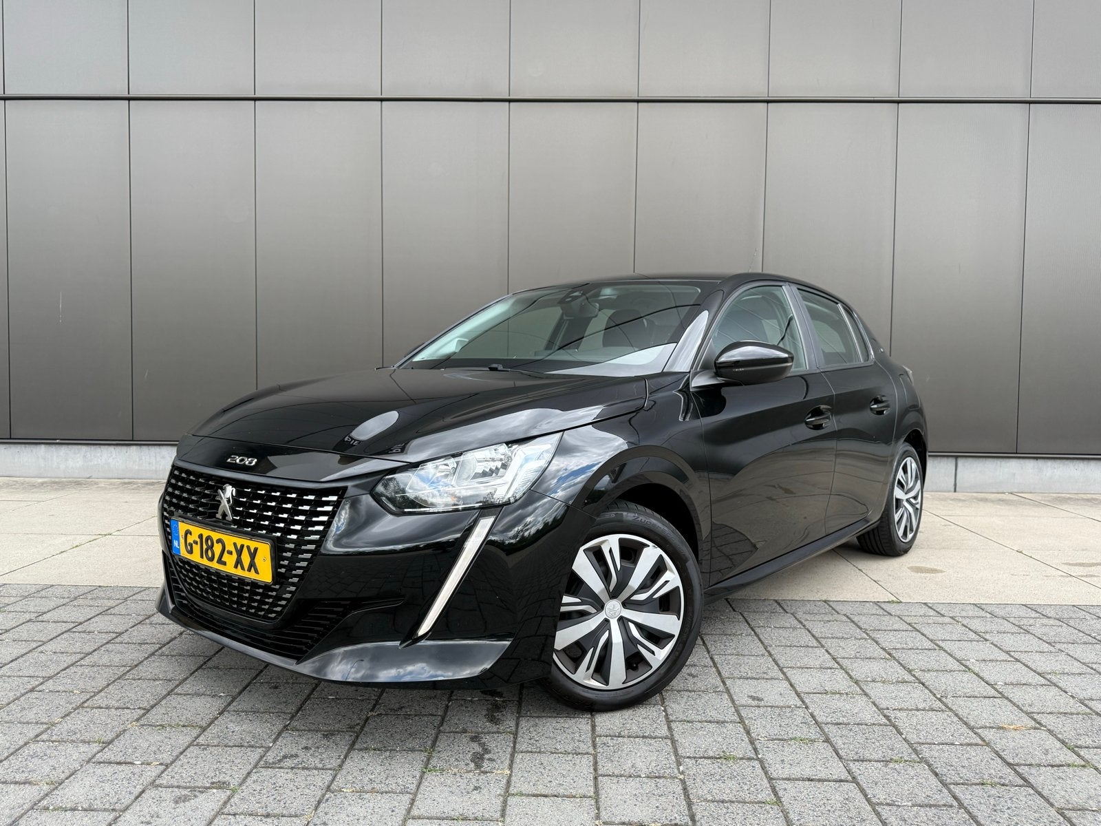 Peugeot 208 1.2 Blue Lease Active | Nav | Airco | Cruise, Voorwielaandrijving, Stof, 1199 cc, Zwart