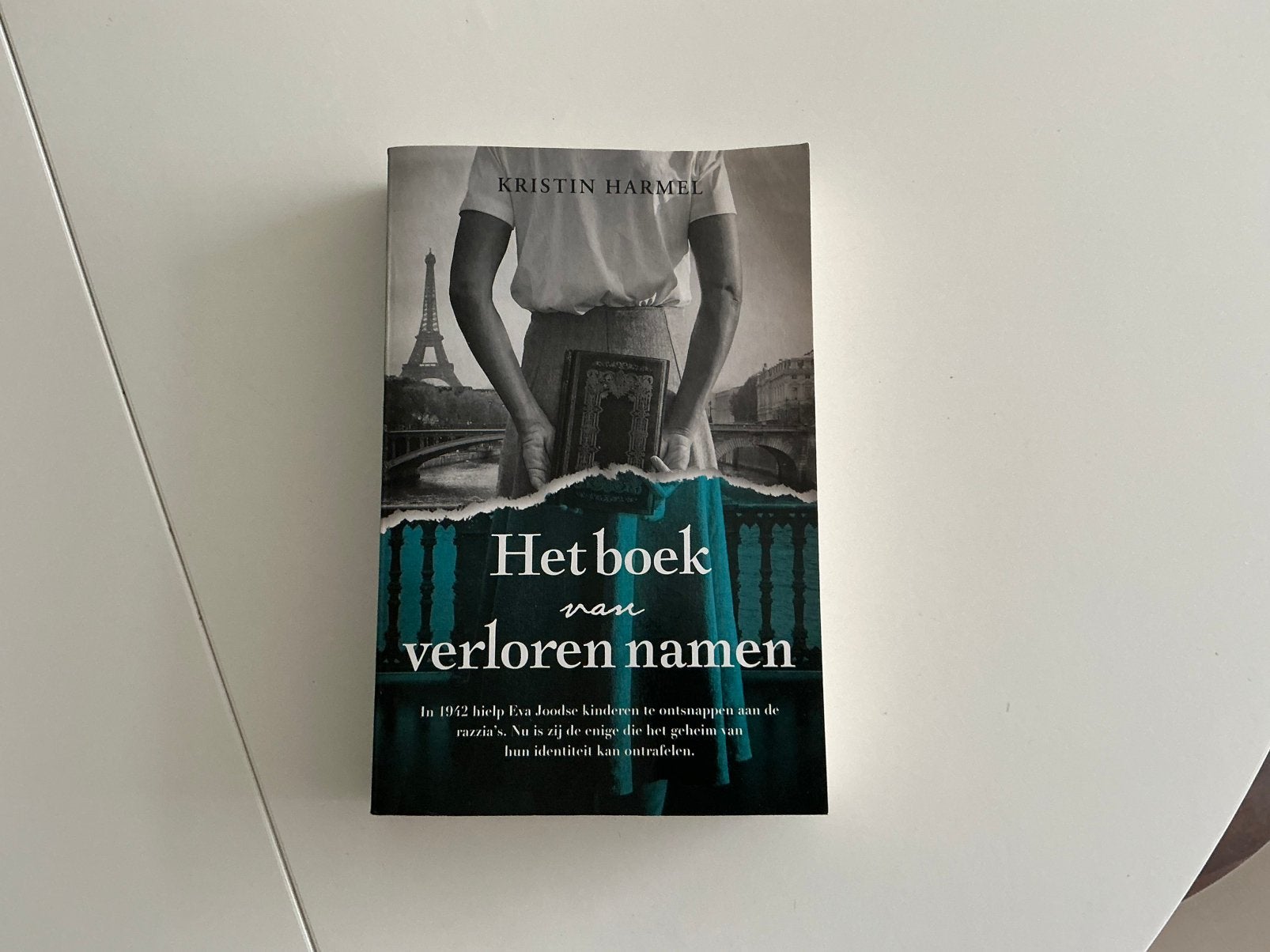 Het boek van verloren namen, Kristin Harmel, Boeken, Ophalen of Verzenden, Zo goed als nieuw